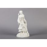 A GRAINGER WORCESTER WHITE BISQUE FIGURE she wears a turban and stands before a rocky outcrop,