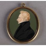A 19TH CENTURY PORTRAIT MINIATURE of a gentleman, head and shoulders in profile, wearing a black