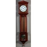 A TEAK CASED WALL CLOCK, the panelled architectural pediment above a glazed hood, white enamel