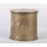TRENCH ART A WWI BRASS SHELL CARTRIDGE engraved with the three quarter portrait of infantryman,