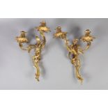 A PAIR OF GILT METAL TWIN LIGHT ENTWINED FOLIATE WALL SCONCES, 41cm high