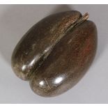 A COCO DE MER SEED SHELL (Seychelles), 33cm approx (in two halves)