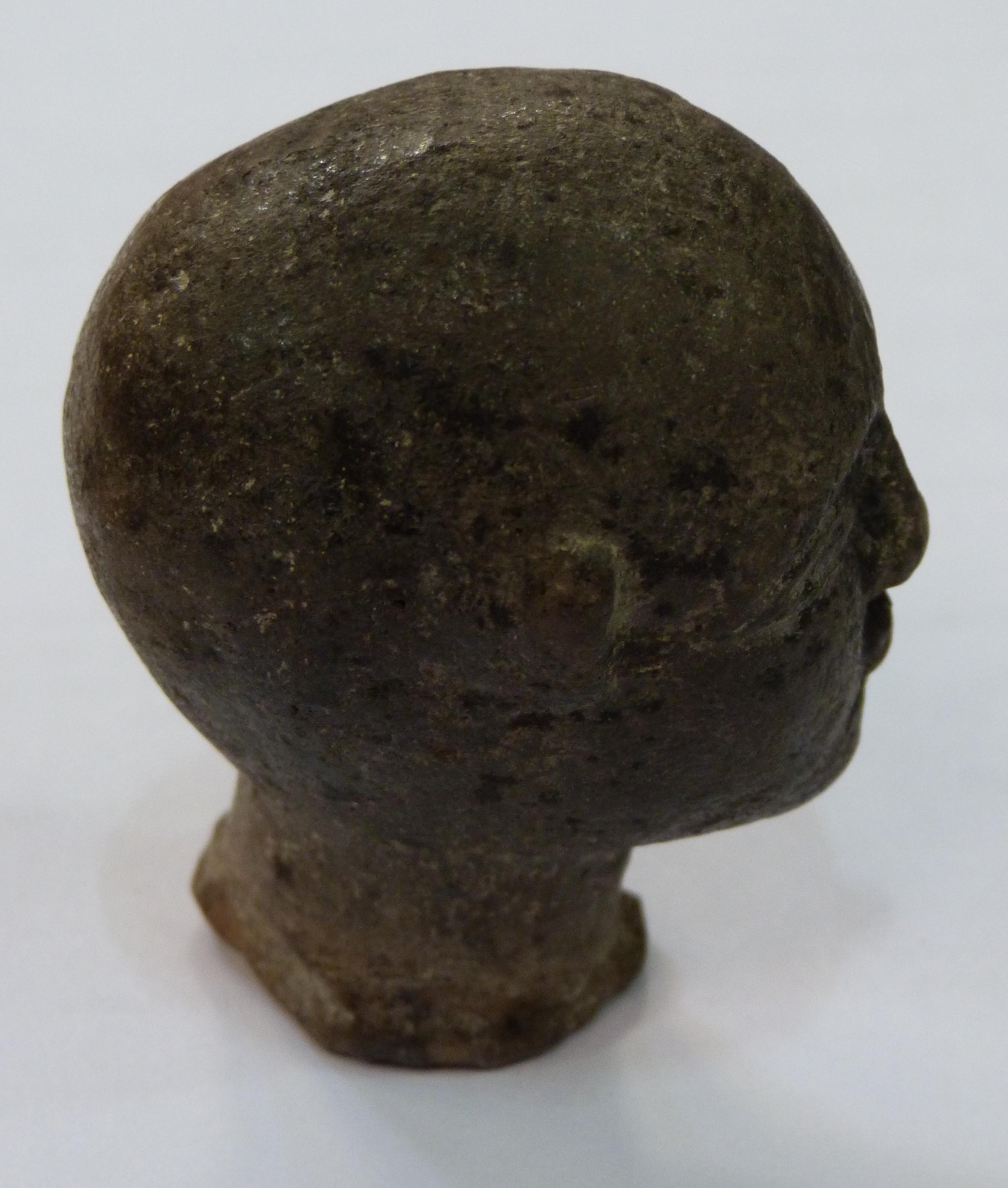 A SMALL POTTERY HEAD realistically modelled with bald pate, shallow oval neck, bearing traces of - Image 5 of 7