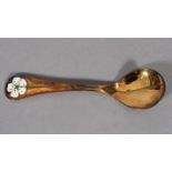 GEORG JENSEN, a .925 silver gilt year spoon for 1971 with cherry blossom motif in white and green