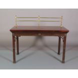 A GEORGE III MAHOGANY SERVING TABLE, having a brass railed gallery, cavetto and fluted frieze with