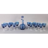 A SUITE OF BLUE OVERLAID AND CLEAR CUT GLASS WINES AND CLARET JUG, each with a broad band of diamond