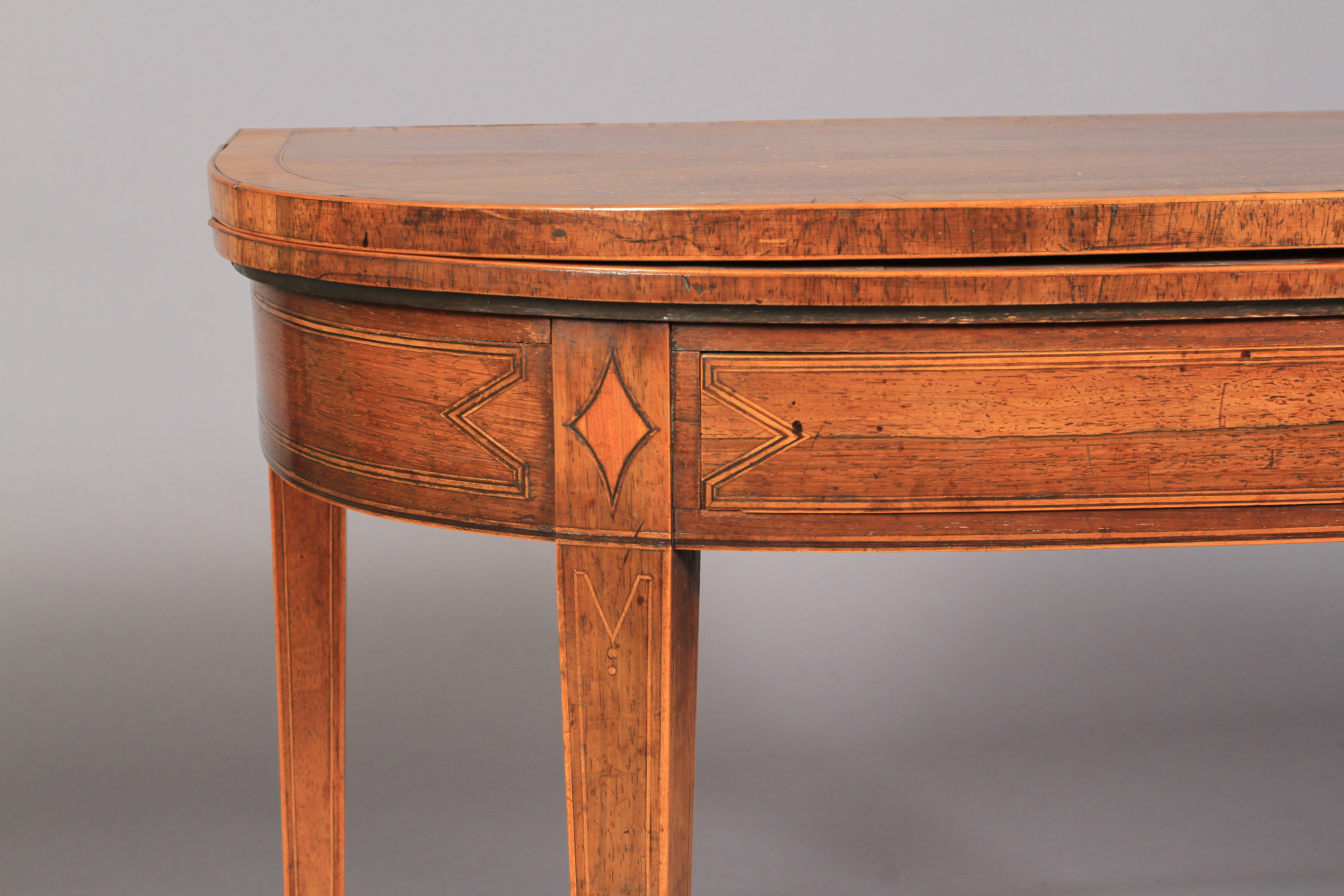 A GEORGE III ROSEWOOD AND SATINWOOD BANDED FOLD-OVER TEA TABLE of 'D' outline, line inlaid with - Image 4 of 6