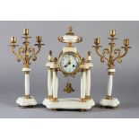 A LATE 19TH CENTURY FRENCH WHITE MARBLE AND GILT METAL three piece clock garniture, the clock with