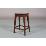A 19TH CENTURY MAHOGANY STOOL, the rectangular top with 'S' finger grip on tapered and splayed