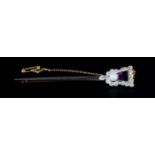 AN ART DECO AMETHYST, DIAMOND AND PEARL ARROW BROOCH in 18ct gold and platinum, the lozenge