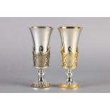 A PAIR OF WESTMINSTER ABBEY SILVER AND SILVER GILT GOBLETS for The Royal Wedding of His Royal