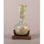 A BLOWN GLASS FLASK, 5th century AD, Eastern Mediterranean, Syro-Palestinian area, transparent