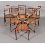 A SET OF SIX GEORGE IV MAHOGANY AND EBONY INLAID DINING CHAIRS, each having a rope twist top rail,