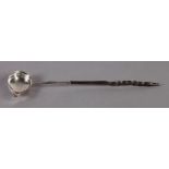 A GEORGE III SILVER TODDY LADLE, engraved with monogram and bright cut decoration, writhen baleen