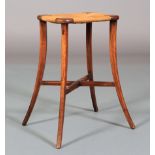 A 19TH CENTURY FRUITWOOD AND RUSH SEATED STOOL, on slender tapered and splayed legs joined by an x