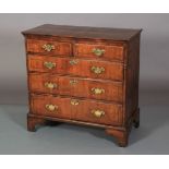 AN 18TH CENTURY WALNUT CROSSBANDED CHEST of two short and three long graduated drawers, line