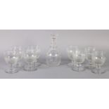 A SET OF EIGHT LARGE WINES AND A TRIPLE NECK DECANTER, feather and slice cut bowl, faceted knop to