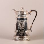 A VICTORIAN SILVER PLATED HOT WATER JUG by Martin Hall & Co, the tapered cylindrical body embossed