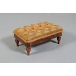 A VICTORIAN ROSEWOOD FOOTSTOOL, rectangular, with canted corners, upholstered in gros point, plain