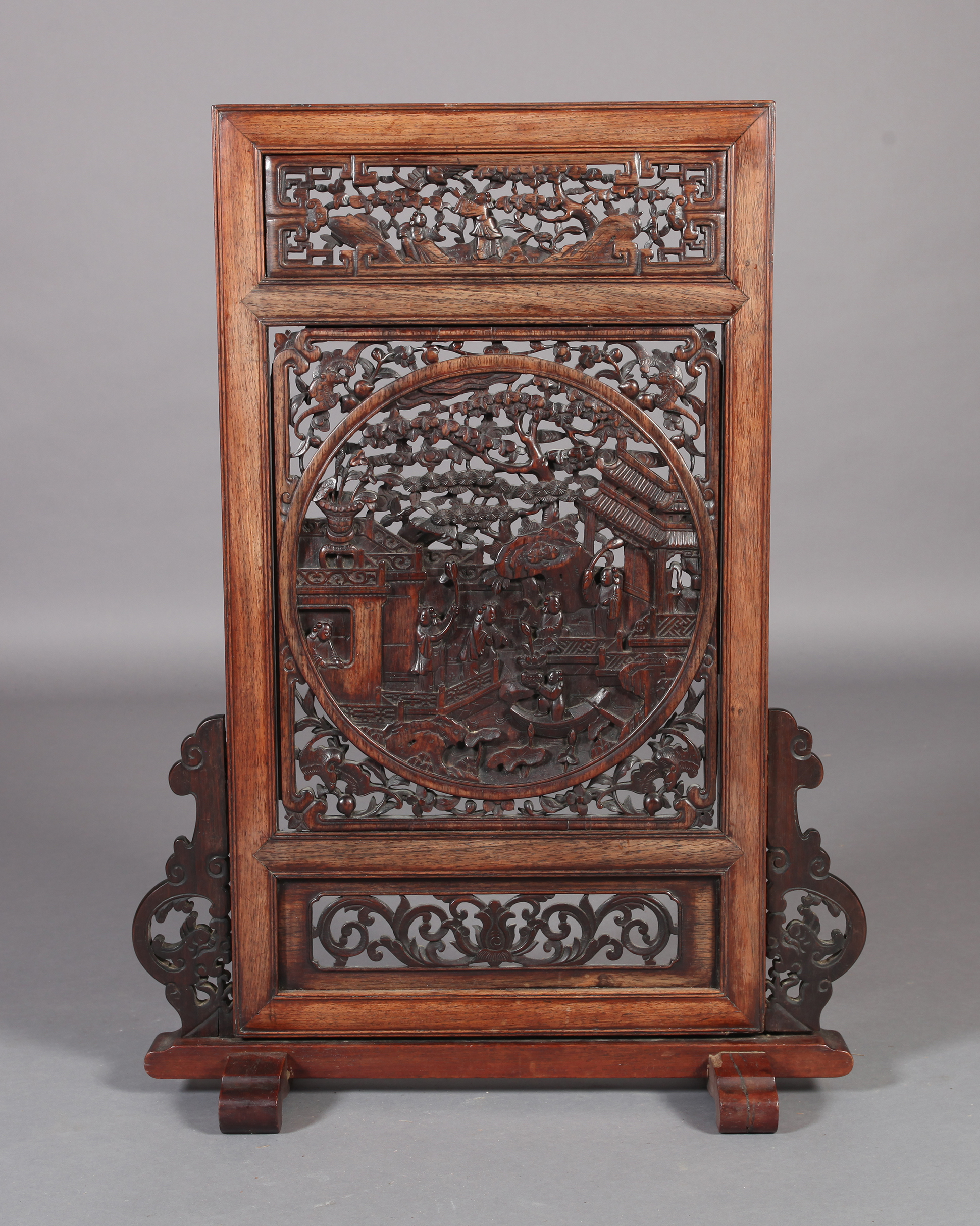 A CHINESE HARDWOOD SCREEN, the rectangular panel with central roundel carved and pierced with