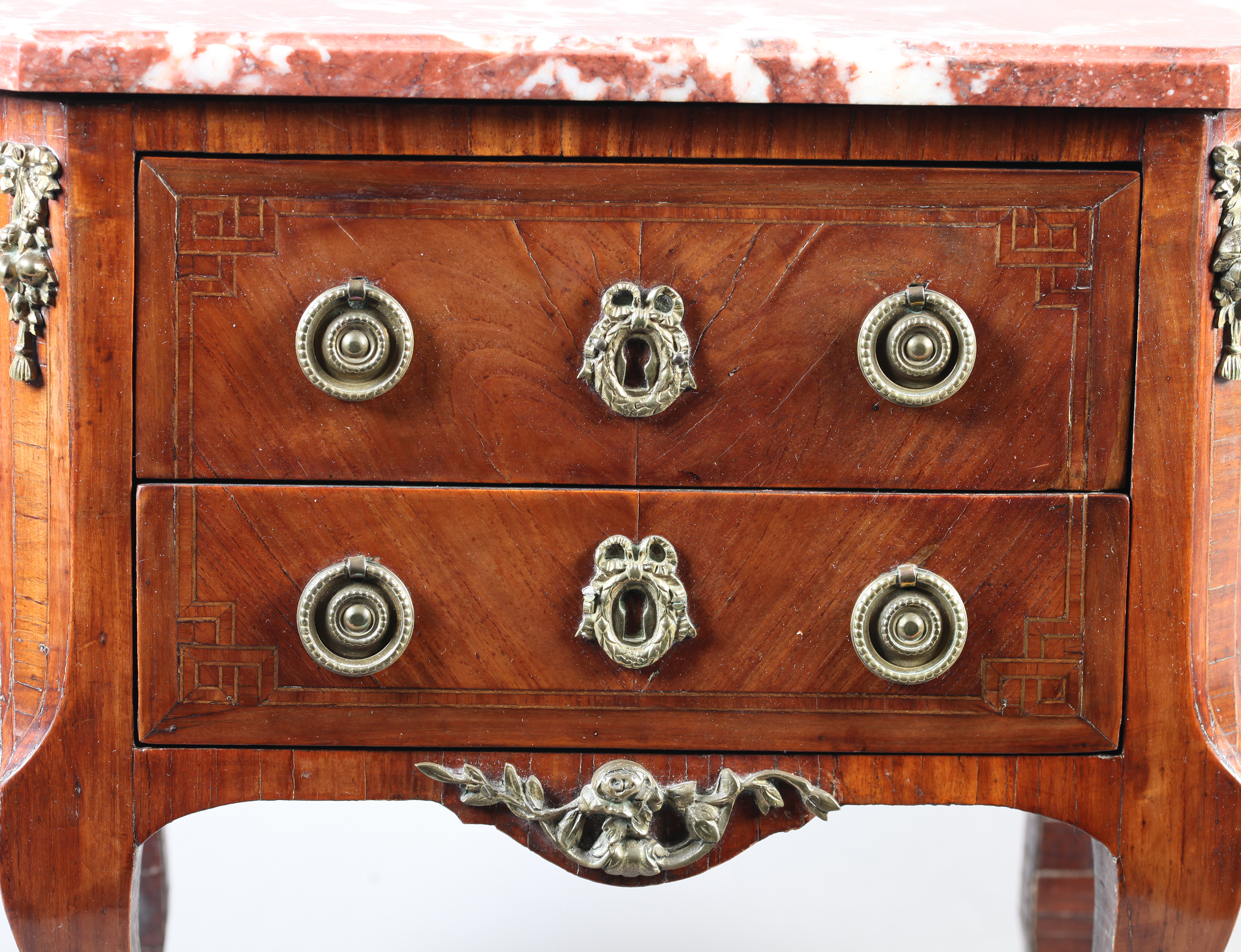 A LOUIS XVI STYLE MINIATURE MAHOGANY VENEERED COMMODE with veined rosso marble moulded top above two - Image 4 of 4