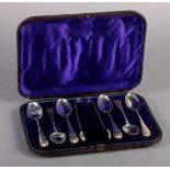 A SET OF SIX VICTORIAN SILVER OLD ENGLISH PATTERN TEASPOONS with shell cast terminals; together with