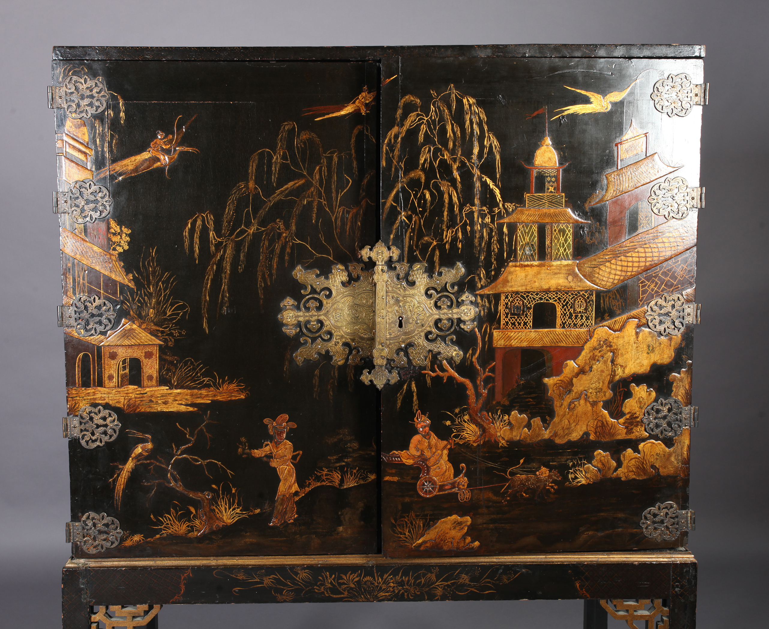 A CHINESE BLACK AND GILT LACQUERED CABINET ON STAND, 19th century, having two doors gilt with - Image 13 of 13