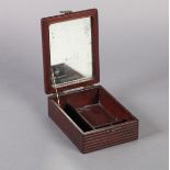 A CHINESE HARDWOOD DRESSING TABLE BOX of rectangular form, the hinged lid with ribbed edge, the body