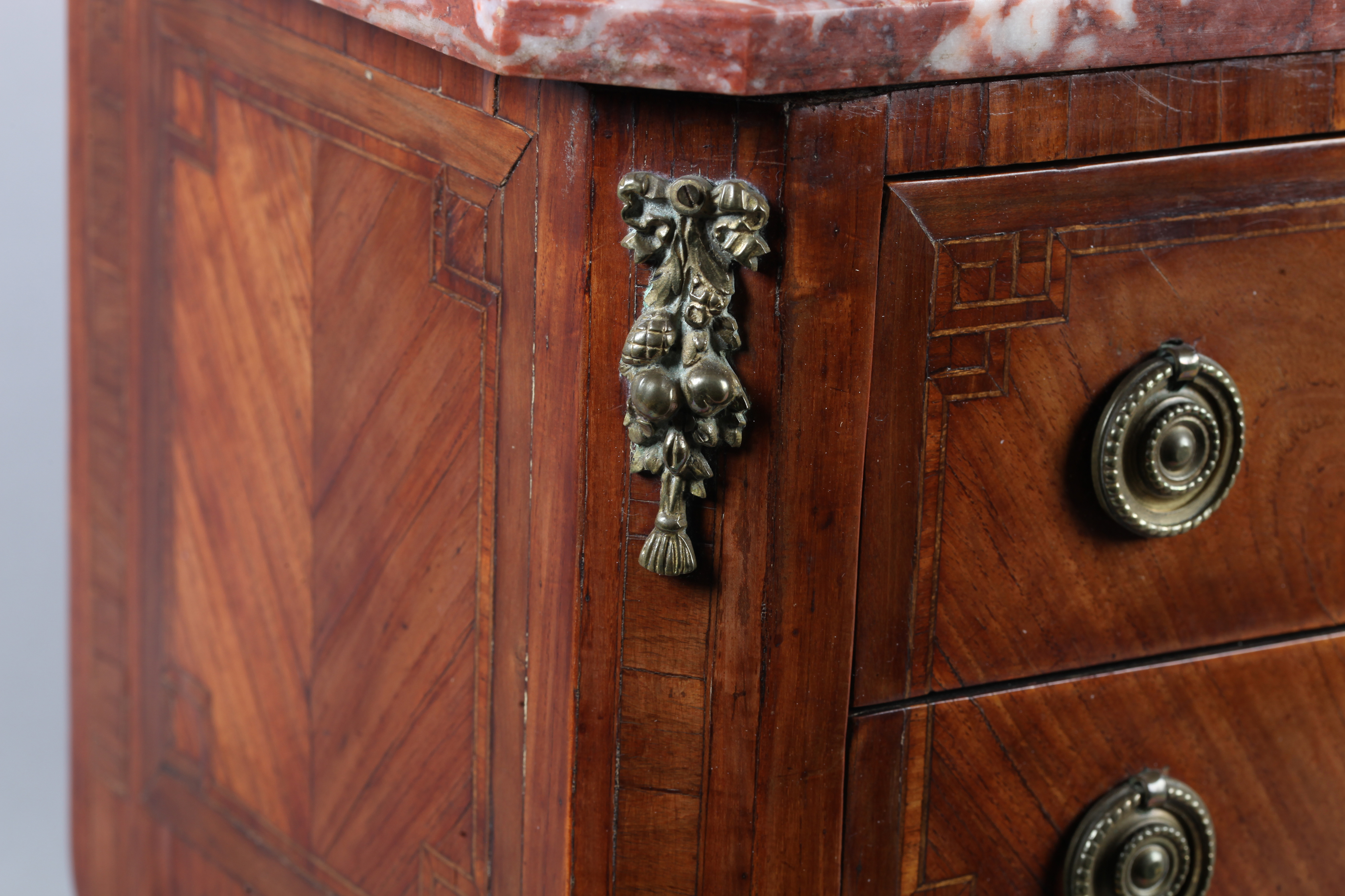 A LOUIS XVI STYLE MINIATURE MAHOGANY VENEERED COMMODE with veined rosso marble moulded top above two - Image 2 of 4