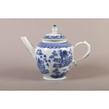 A CHINESE EXPORT BLUE AND WHITE TEAPOT, Qianlong Period, ovoid with semi-domed cover and bud finial,