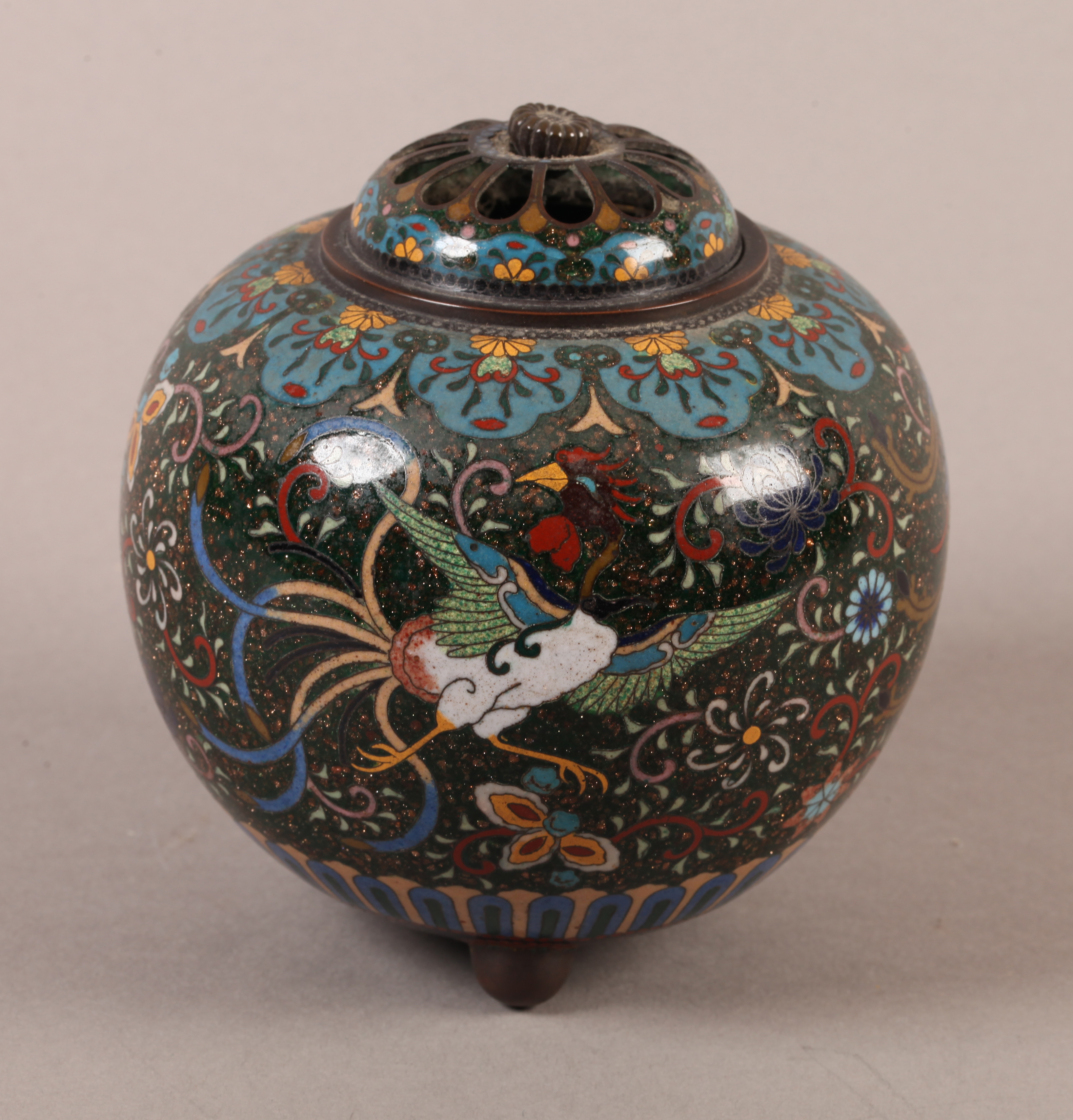 A CHINESE CLOISONNE KORO of spherical form, the domed and pierced cover with bud finial, the green
