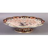 A DERBY CROWN PORCELAIN COMPANY LARGE TAZZA of petal shaped circular form decorated in Imari palette