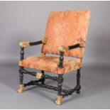 AN 18TH CENTURY ITALIAN EBONISED AND GILT ARMCHAIR, stuffed over rectangular back and seat with