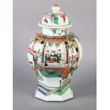 A CHINESE OCTAGONAL PANELLED BALUSTER VASE decorated with emperor, attendants and other figures