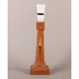 A THOMPSON OF KILBURN 'MOUSEMAN' ENGLISH OAK TABLE LAMP c.1960s, the tapered octagonal column carved