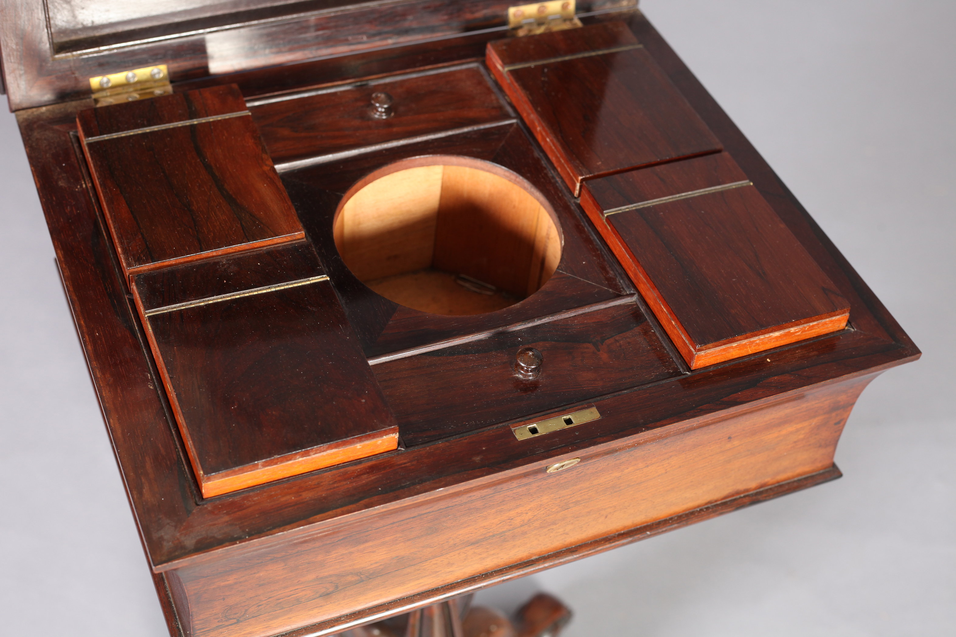 A VICTORIAN ROSEWOOD VENEERED TEAPOY, the shallow sarcophagus shaped top hinged to reveal an - Image 3 of 4