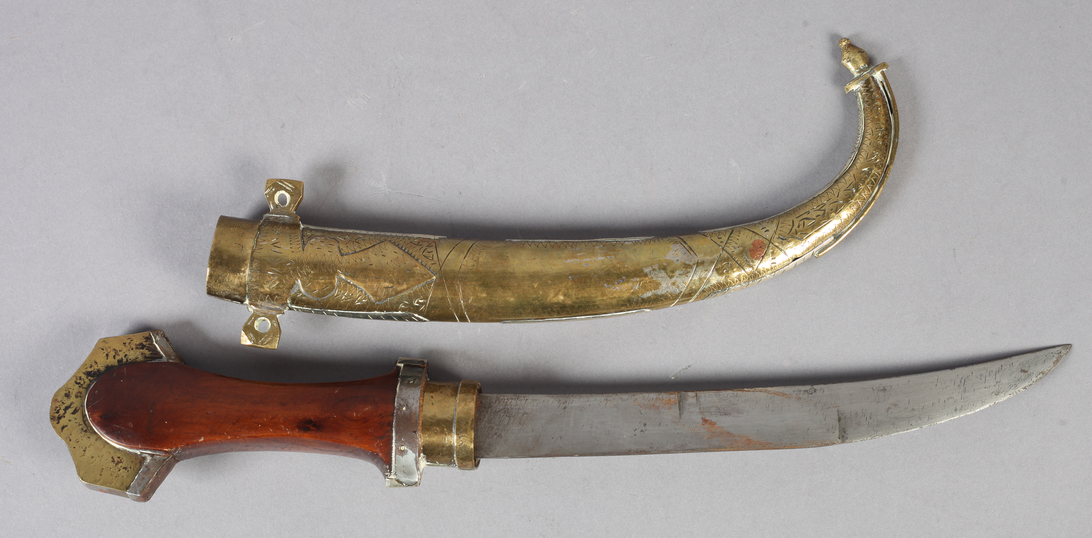 A MIDDLE EASTERN DAGGER (JAMBIYA) curved blade 21.5cm long, hardwood grip with chased white metal - Image 3 of 6