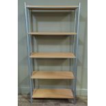 A modern metal framed open wall shelf, 84cm wide x 180cm high