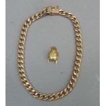 A bracelet in hollow curb links of 9ct gold together with a 9ct gold ladybird charm, total