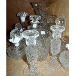 Glass ware including, a pair of candlesticks, three plain bottles with fanned stoppers, three
