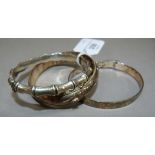 Three stiff hinged bangles all in silver, total approximate weight 44gm