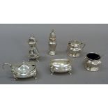 A three-piece circular condiment set, London 1937, a oblong mustard and salt, Birmingham 1955 and