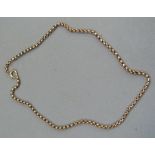A Victorian neckchain in 9ct rose gold faceted belcher links, approximate length 46cm, approximate