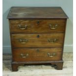 A George III style mahogany chest, the figured top above three drawers shaped bracket feet, 72cm