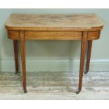 A Sheraton period mahogany card table, the figured top with cross banded border and boxwood