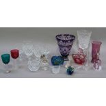 An amethyst and clear glass flower vase, a cut pedestal flower vase, modern cranberry table bell and