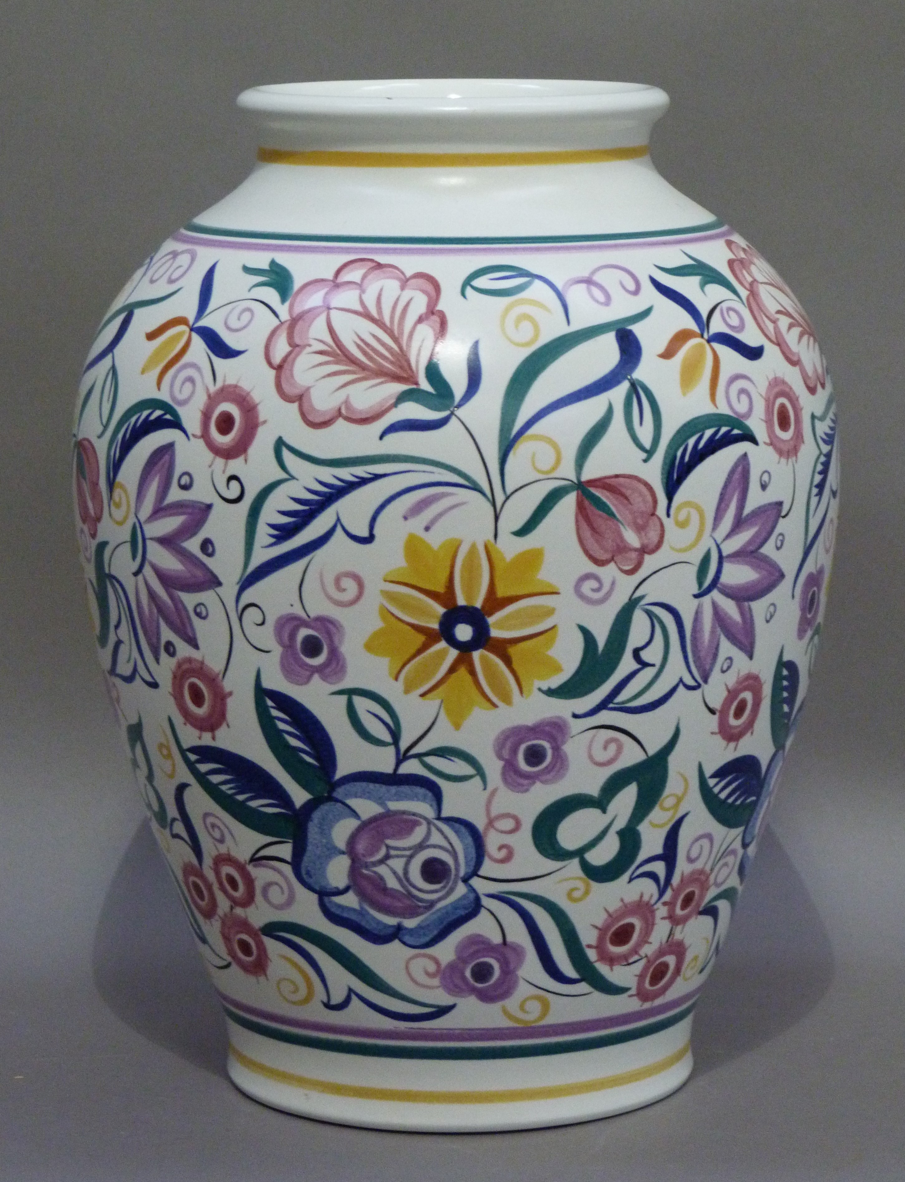 A large Poole pottery vase painted by K Hickisson in typical flower style, 34cm high - Image 2 of 2