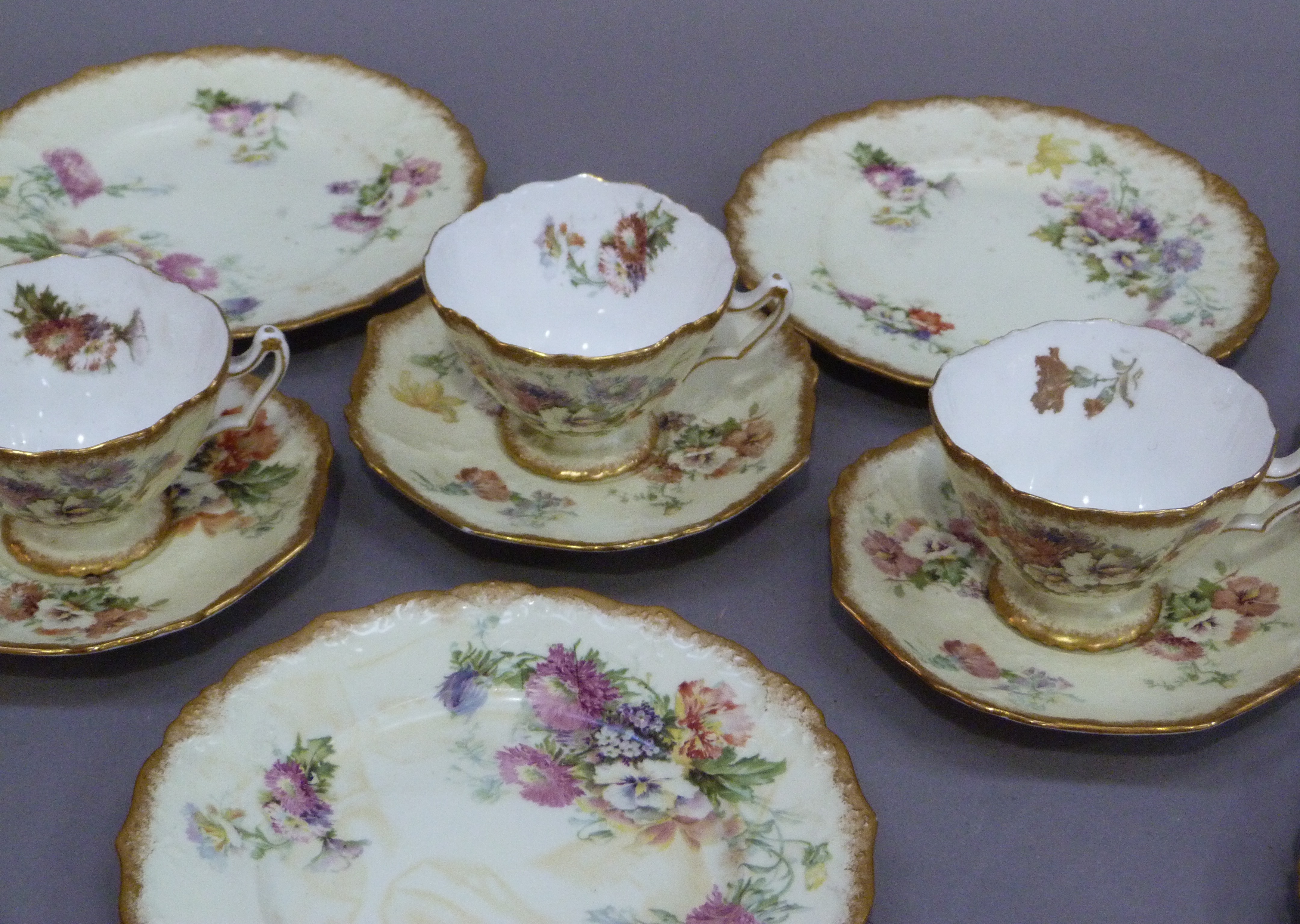 A Hammersley china tea service pale yellow ground printed with sprays of flowers within a gilded and - Image 2 of 3