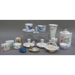 A pair of Spode china chamber sticks, a china Elizabeth II coronation mug with gilt lion handle,