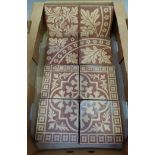 Eight Mintons floor tiles, a set of four decorated with stylised leaves within a quatrefoil and